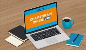 Laptop with Chamberlain Online BSN on screen, notebooks, and coffee mug